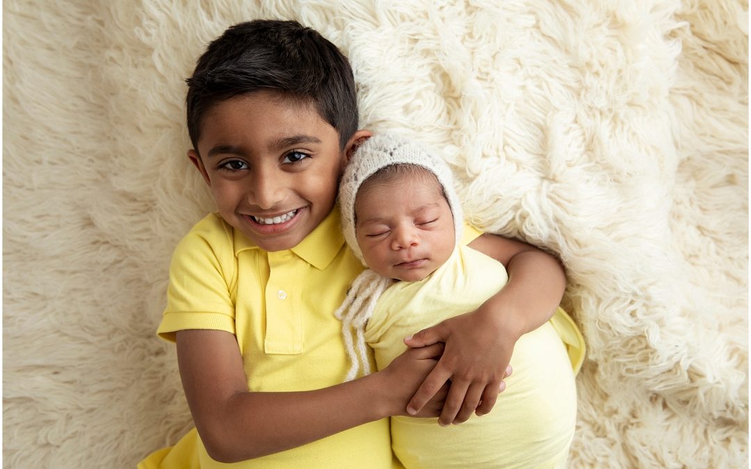 Capturing Eternal Bonds: The Significance of Sibling Photos in Newborn Photoshoots