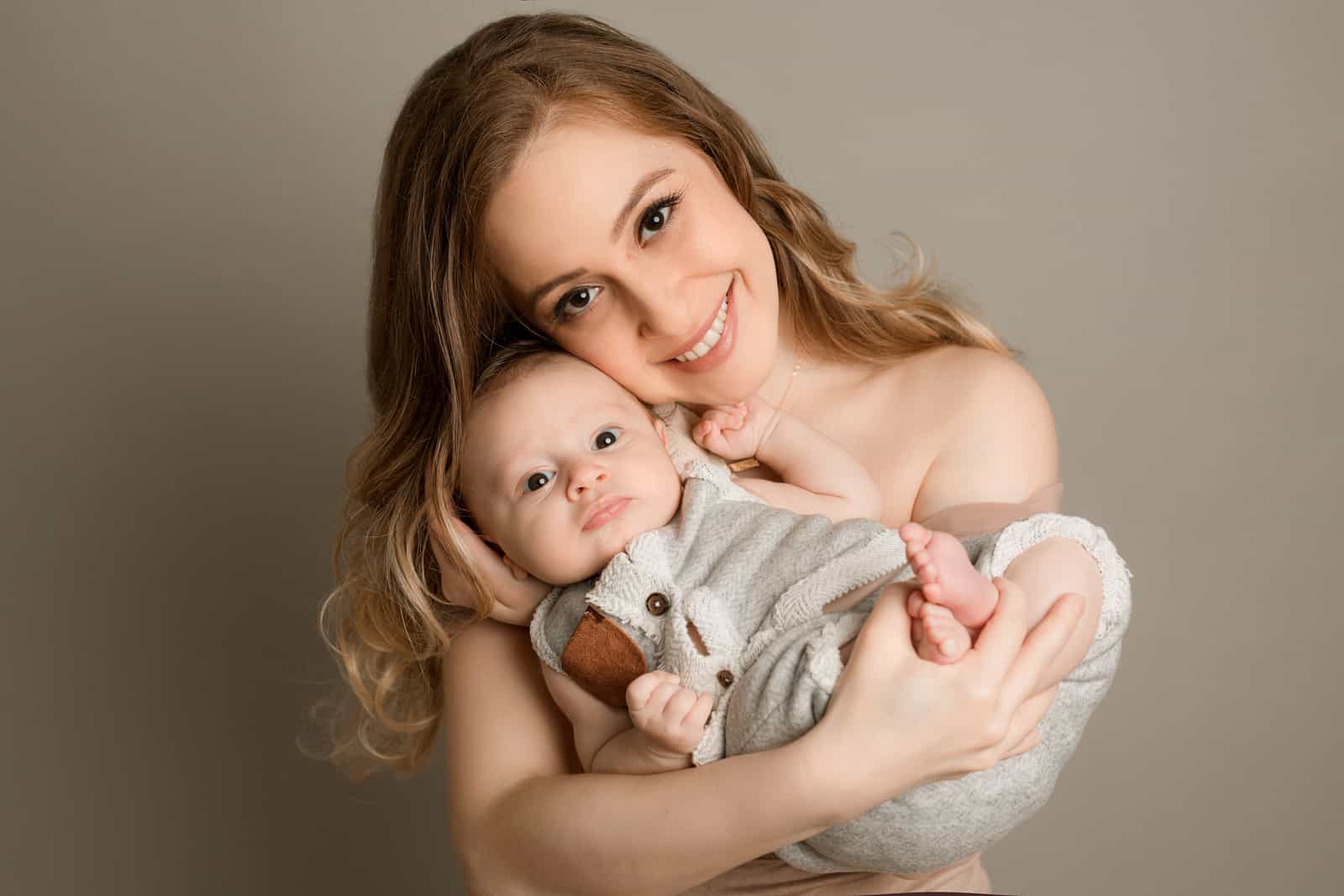 mom and baby in newborn photoshoot